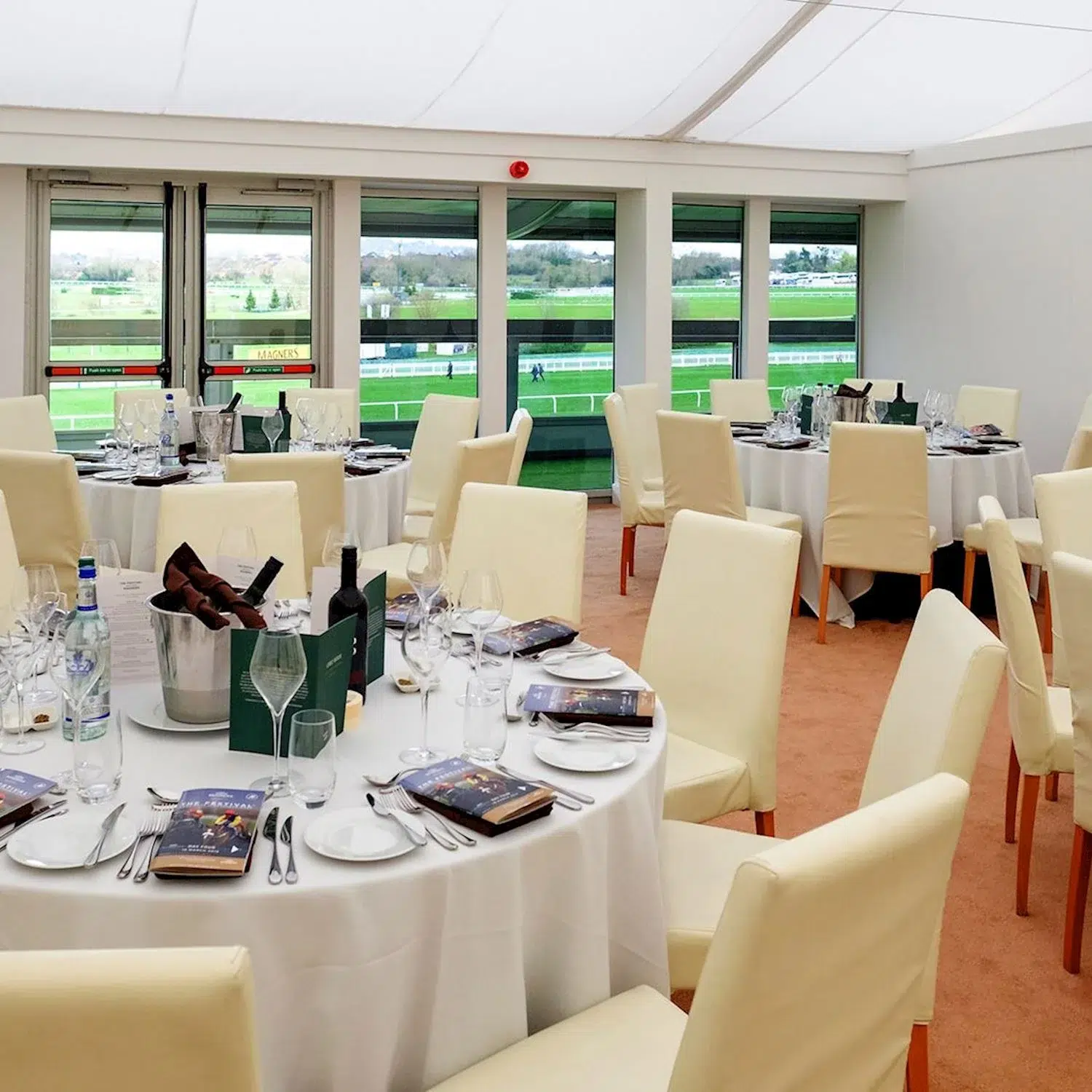 Luxury Private Boxes at the Cheltenham Festival, offering an exclusive hospitality experience with fine dining, panoramic racecourse views, and a private setting for an unforgettable day at the races