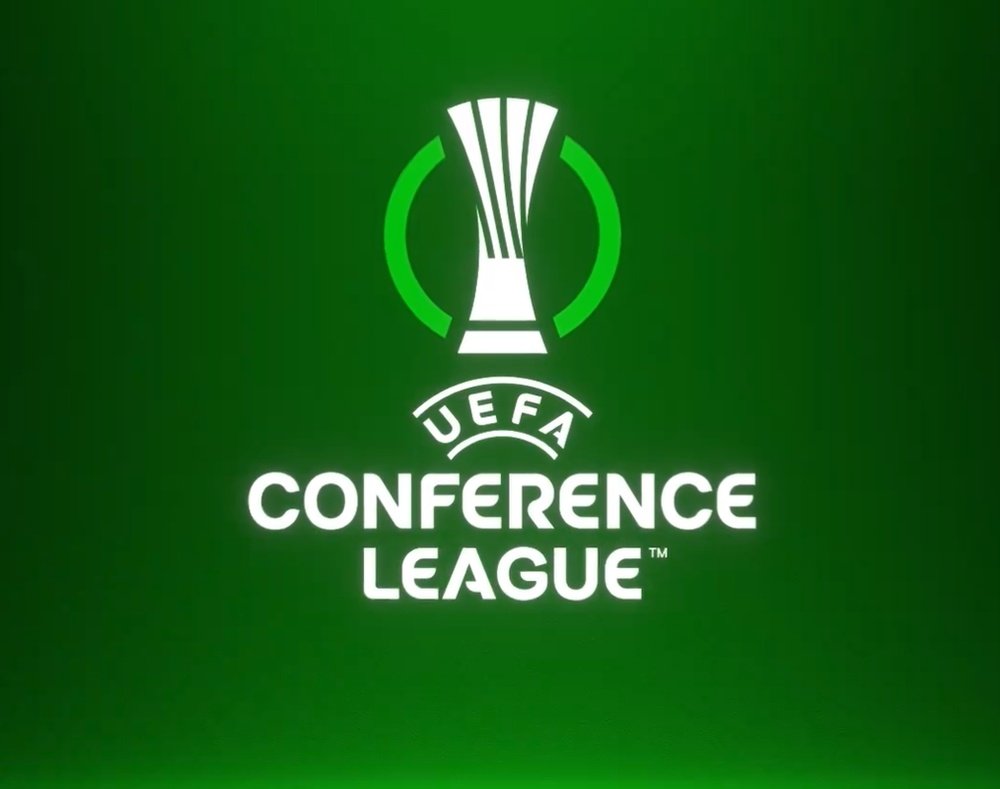 UEFA Europa Conference League trophy with glowing green wave design background highlighting tournament branding
