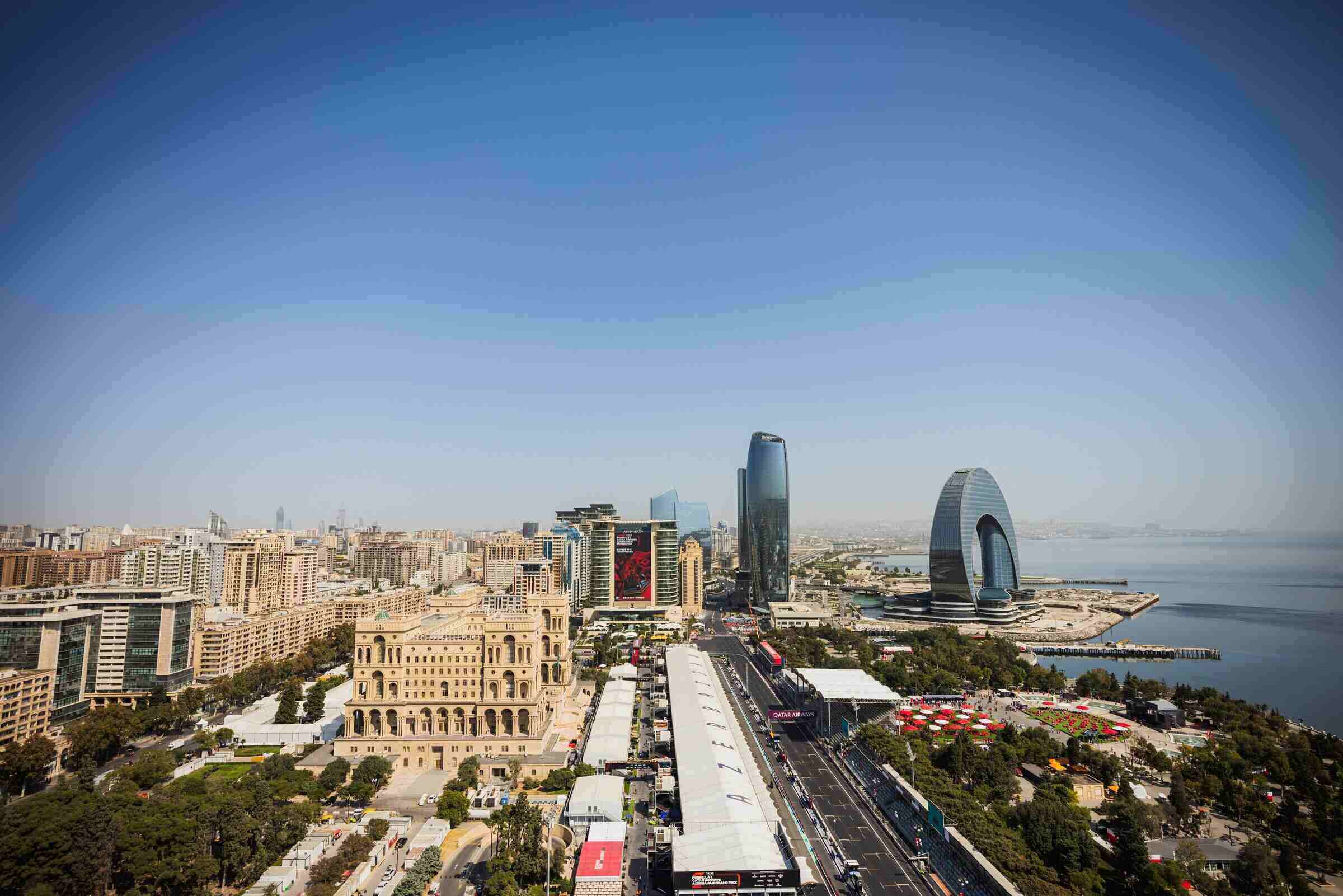Aerial view of Baku cityscape during Azerbaijan Grand Prix with F1 track along the waterfront and modern skyline