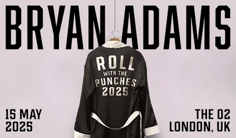 Tour poster for Bryan Adams' "Roll With The Punches 2025" concert. A black satin boxing-style robe hangs on a hook, with the tour name embroidered on the back. The poster text includes the date 15 May 2025 and venue The O2, London, UK, displayed in bold black font on a pale background