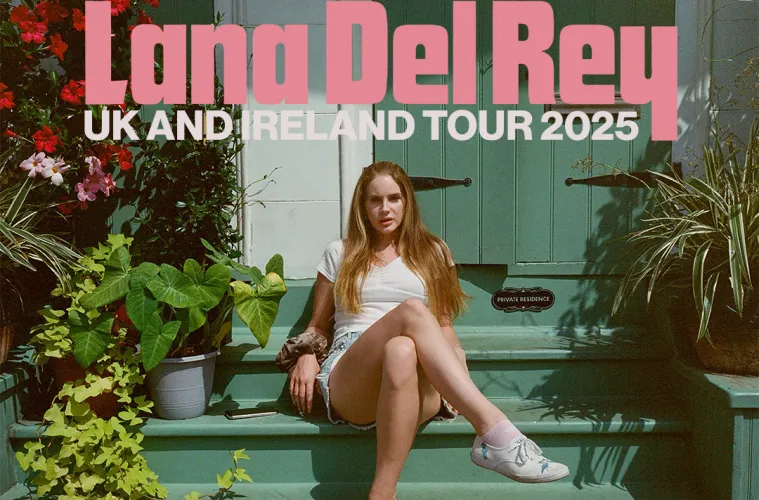 Lana Del Rey sits on a green doorstep surrounded by plants, with bold pink text above reading ‘Lana Del Rey UK and Ireland Tour 2025