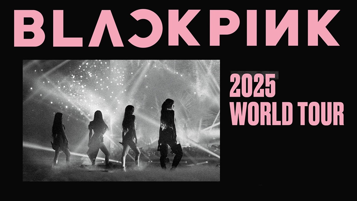 BLACKPINK 2025 World Tour poster featuring the group's name in pink, a black-and-white stage photo of the members, and bold pink tour text on a black background