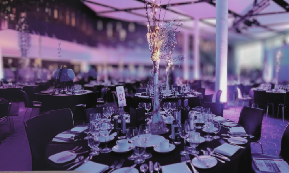 Luxury private box at Wembley Stadium twenty one package featuring elegant fine dining setup with premium seating overlooking the pitch for VIP hospitality experience