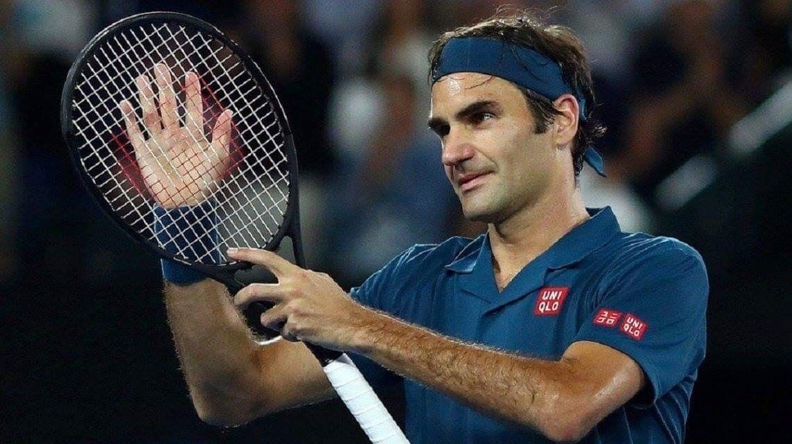 Roger Federer holding a racket